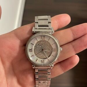 Michael Kors, silver watch with silver trim, super shiny and super beautiful